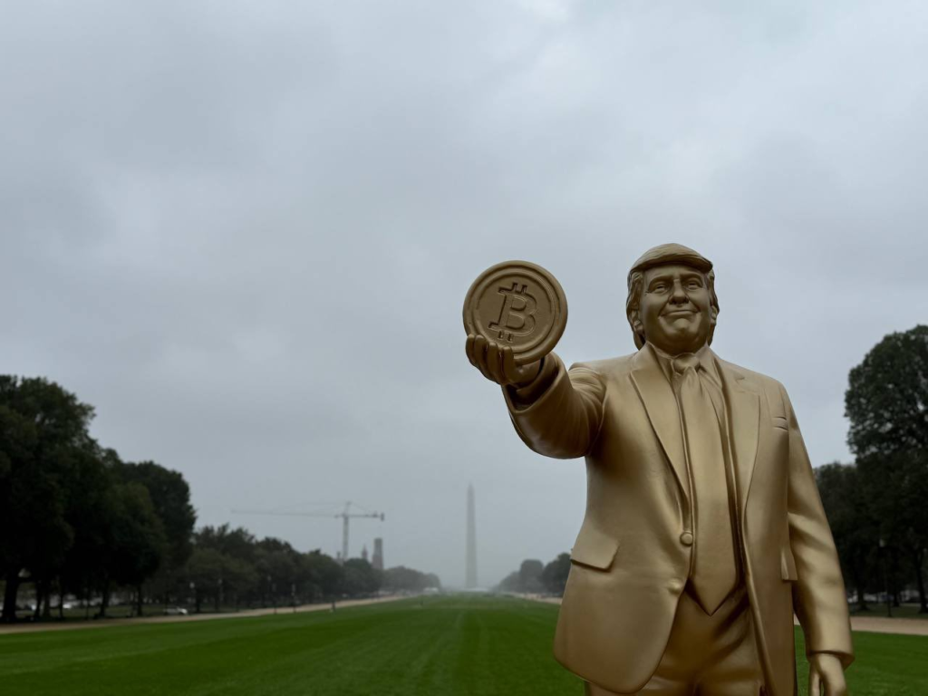 Golden Trump Statue Holding Bitcoin Unveiled Outside U.S. Capitol in Crypto Stunt